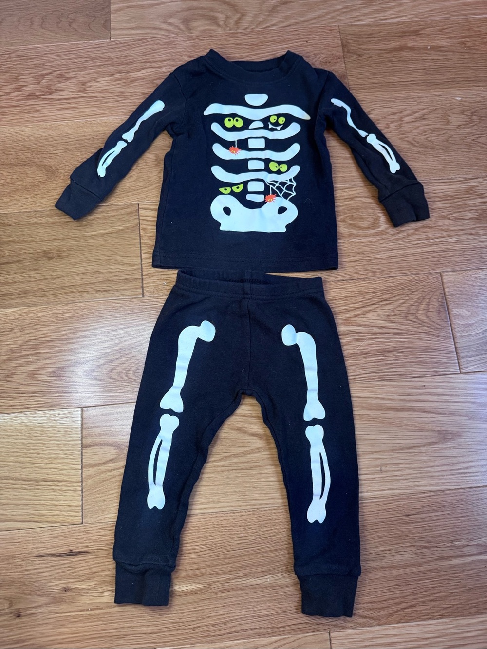 Carter's Black Skeleton Glow Pajama Set with Yellow Eye Accents